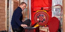 Man doing Blower Door Test 